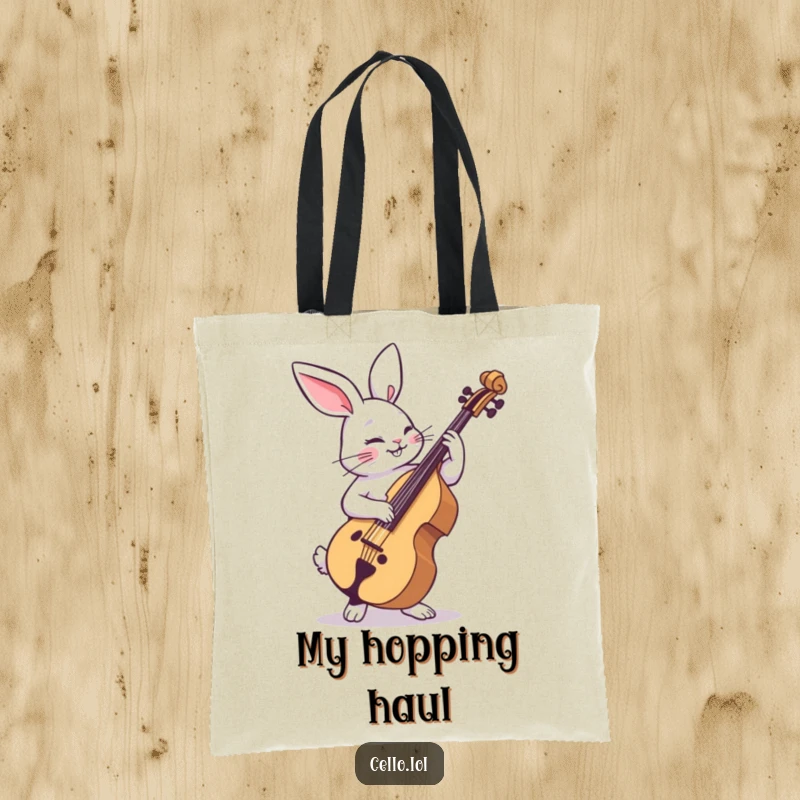 Funny rabbit tote bag strumming cello with playful abandon, a stylish and humorous accessory for music lovers. Great funny gift.